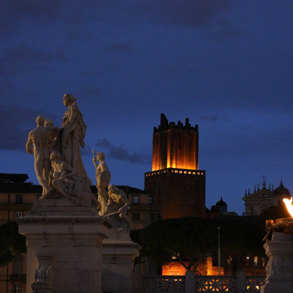 A quiet Roman piazza by night, evocative of Paolo and Vittorio Taviani's films